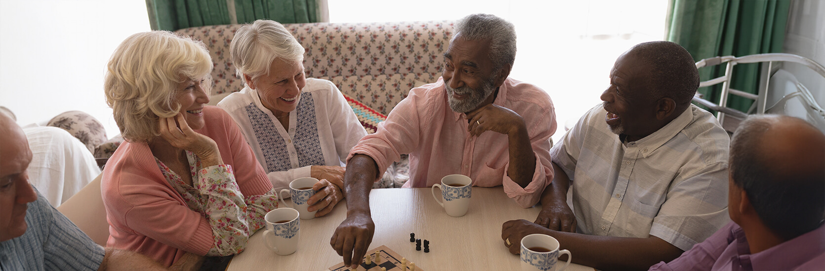 group of seniors playing chess
