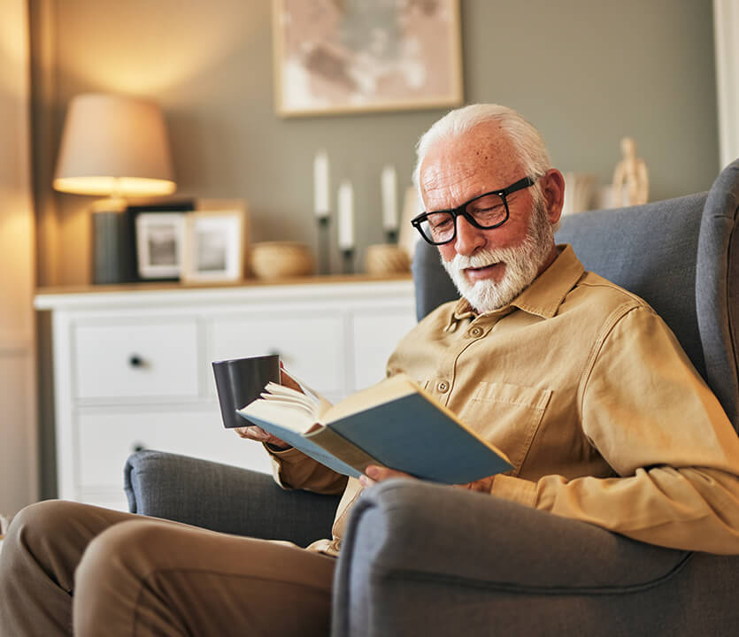 senior man reading a book