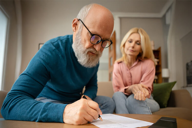 Couple signing contract