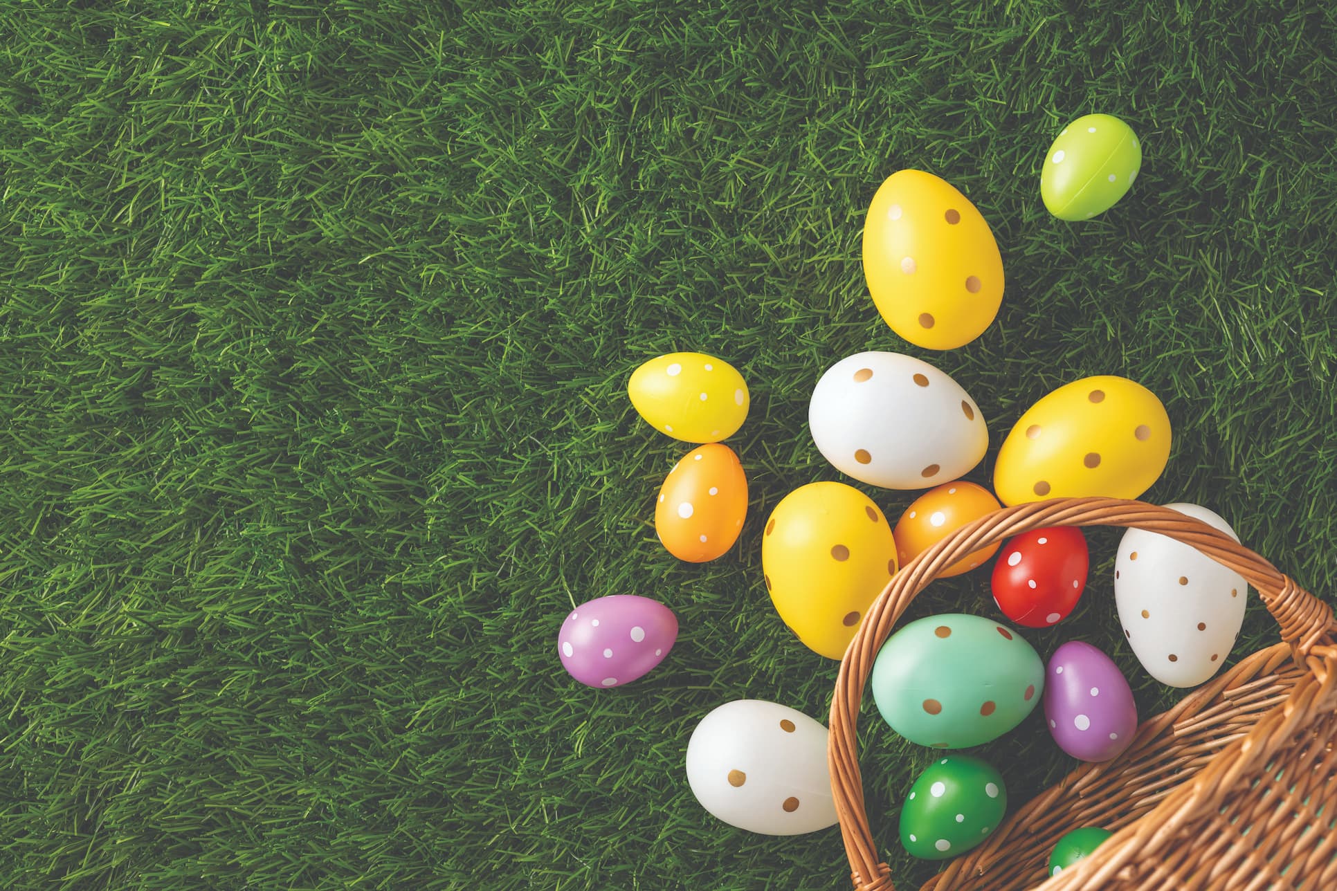 Easter Egg hunt basket and spilling eggs